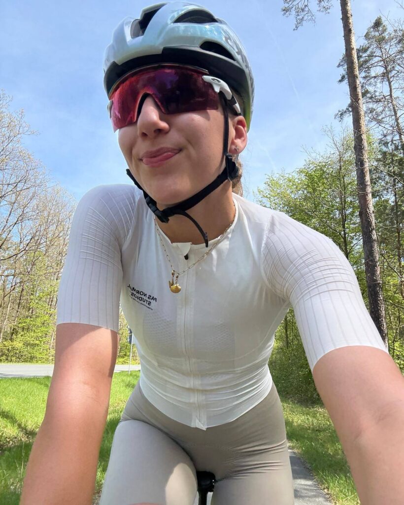 Leann Dietzel on the bike, looking into the camera