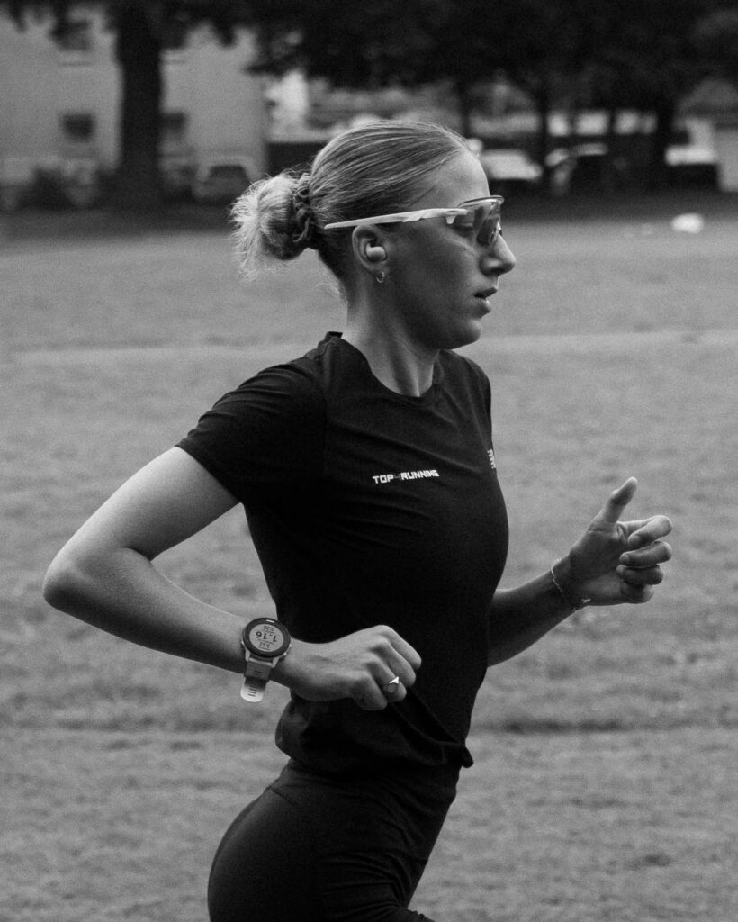 Black and white photo of Leann Dietzel out running